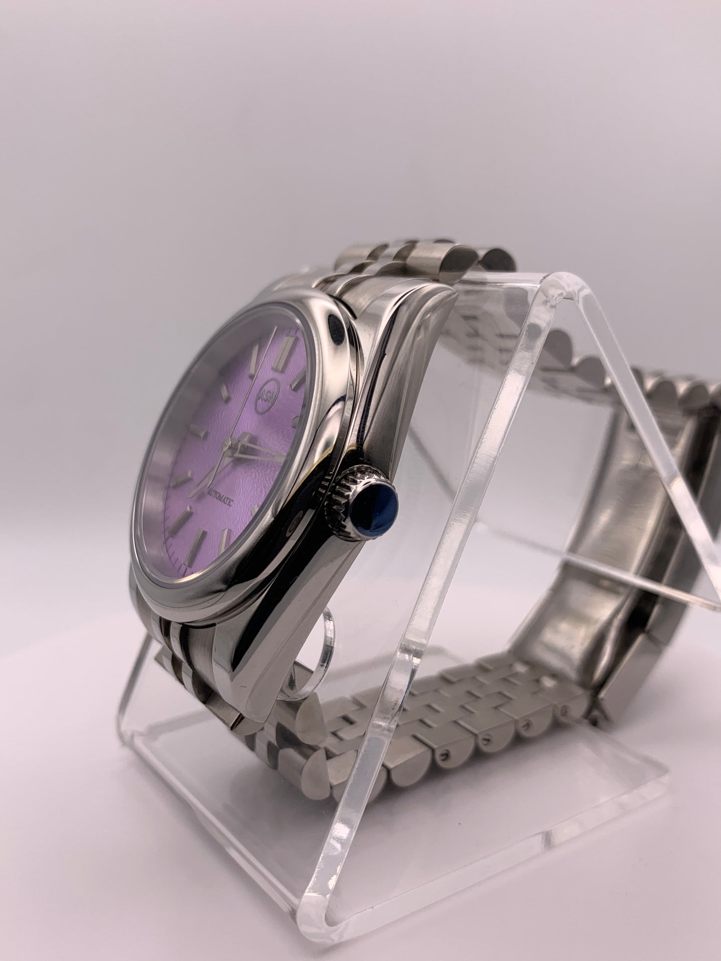 ‘Sold - Highly figured lavender dial. 36mm sport watch on bracelet.