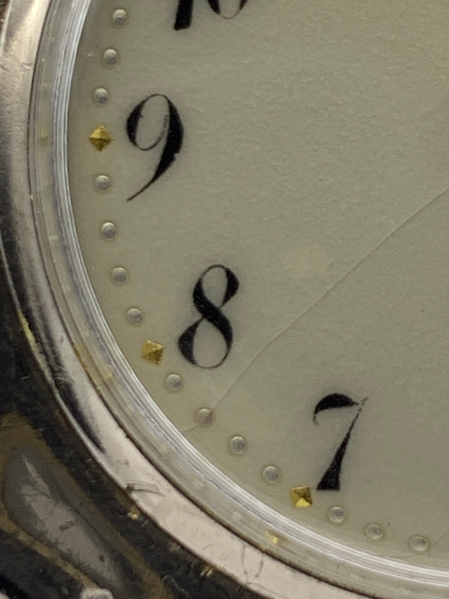 Palimpsest.  40 x 40mm plated brass case. Vintage pendant watch conversion. Domed acrylic crystal. Original enamel dial. Miyota 2036.