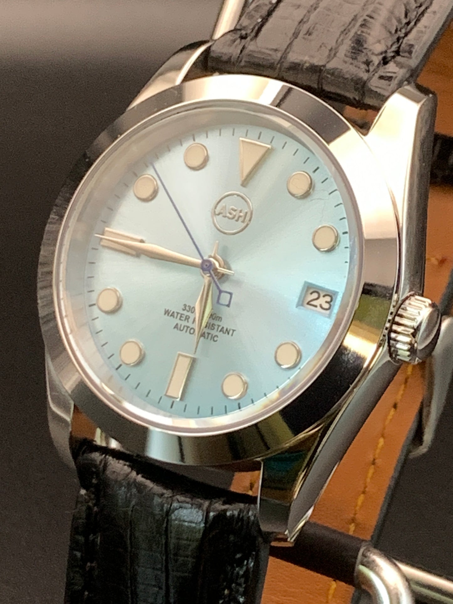 36mm Light blue sunray sport watch. Seiko NH35 Automatic.