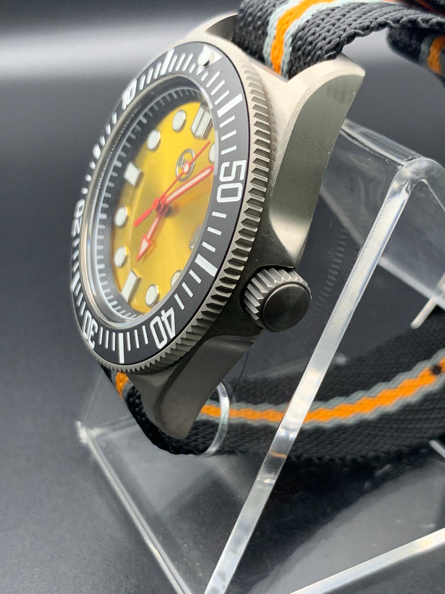 Titanium 42mm dive watch. Fixed lugs. Sapphire crystal. Seiko NH35. 200m water resistance.