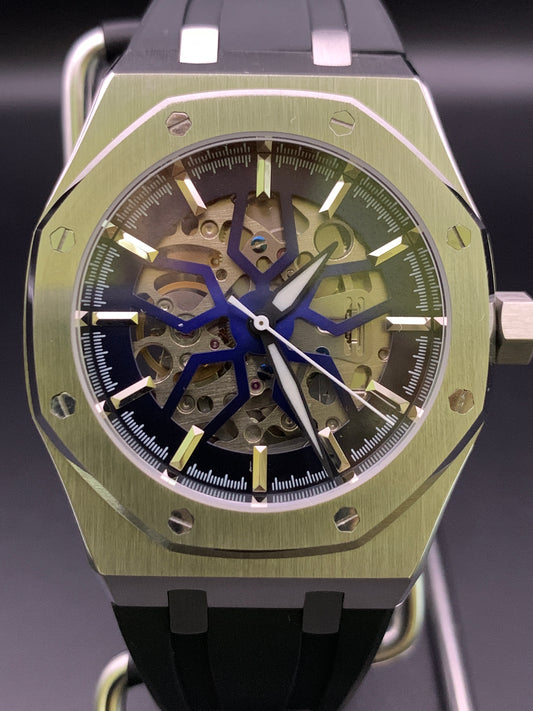 ‘Royal Oak’ style. Blueburst skeleton dial. Sapphire crystal. Seiko NH70. Bracelet and rubber strap included.