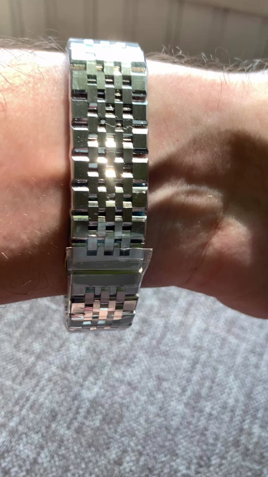 Nocturne. 40mm stainless steel case with matching bracelet. Box sapphire crystal. Seiko NH35