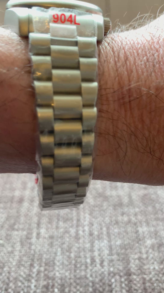 Microcosm. 31mm Brushed stainless steel with matching bracelet. Sapphire crystal. Seiko NH05 automatic.