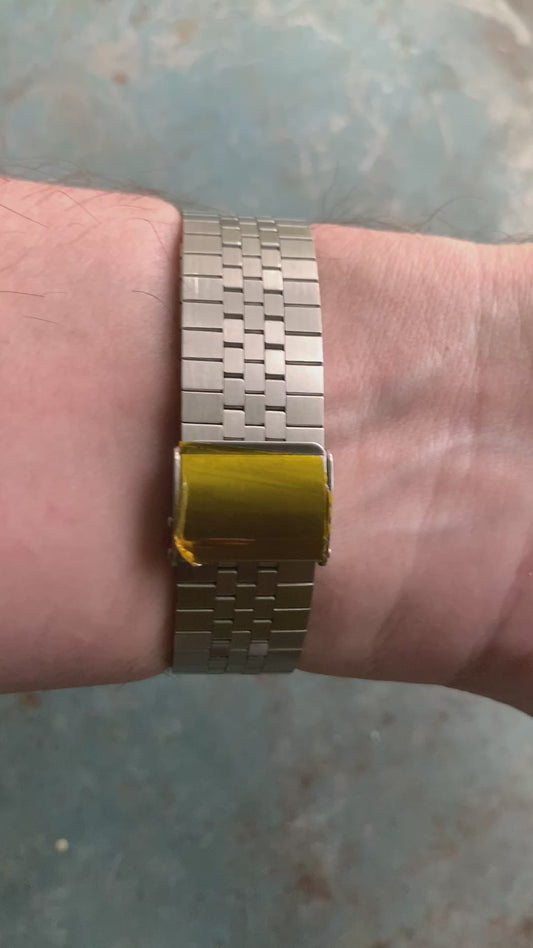 GORT. 41mm Vintage case and NOS vintage bracelet. 37mm lug to lug. MOP dial. Acrylic dome. Seiko VH31 mecha-quartz.